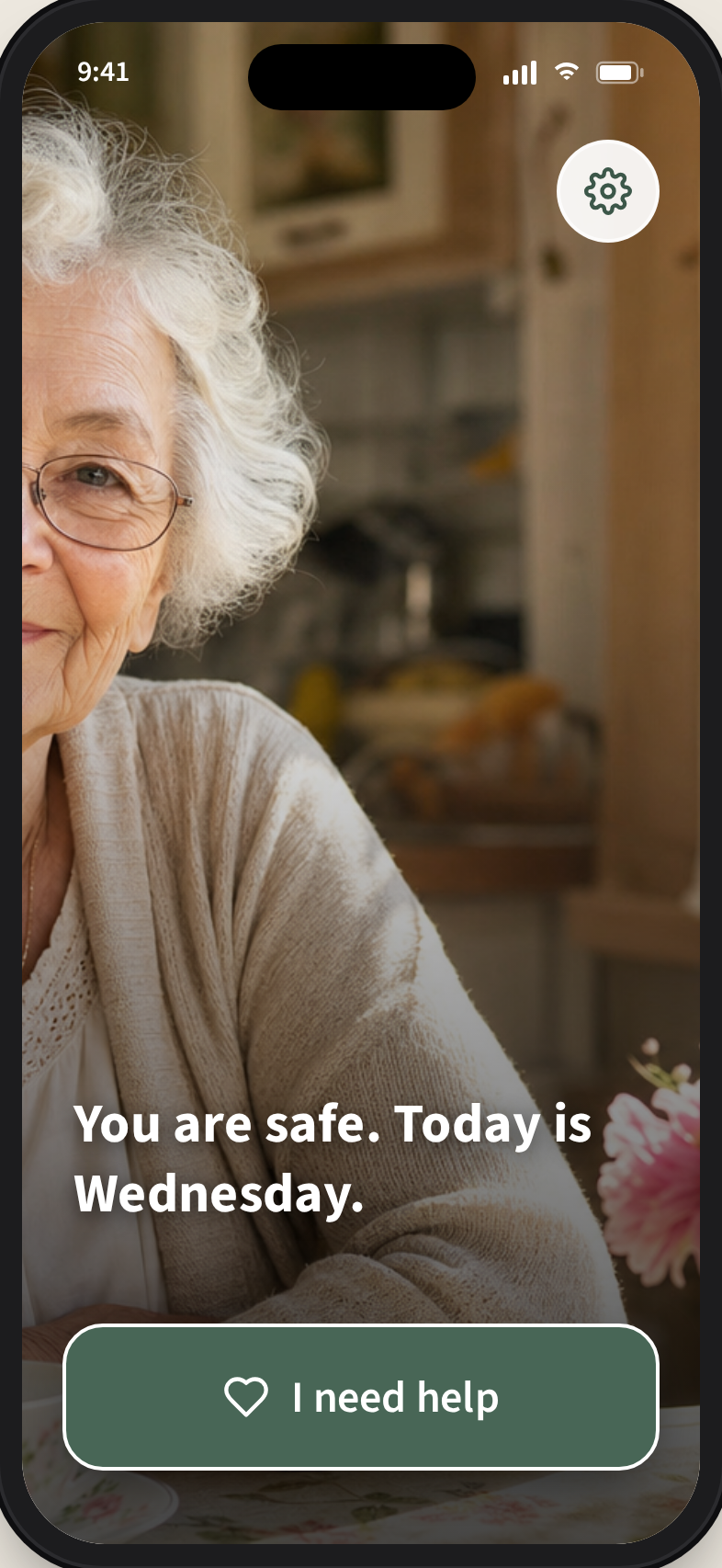 Comfort Mode home screen with a warm family photo, an orientation cue, and a single large 'I need help' button.